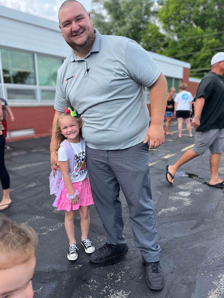 Nick after graduation with his daughter